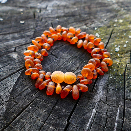 red raw amber teething beads